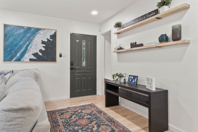 foyer with light hardwood / wood-style flooring