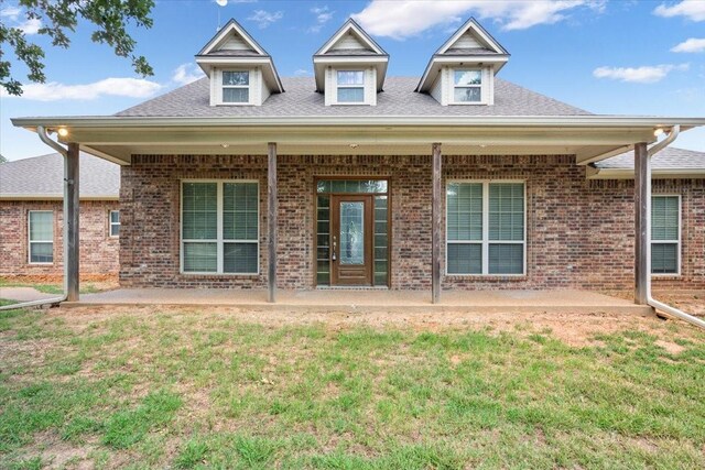 exterior space featuring a yard