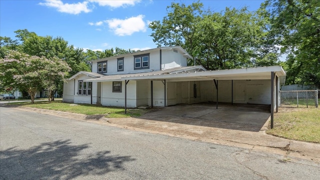 view of front of house featuring a carport