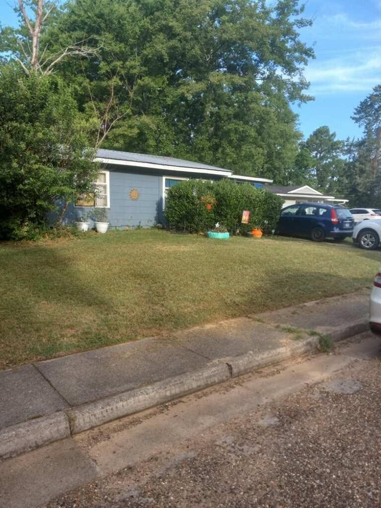 exterior space with a front yard