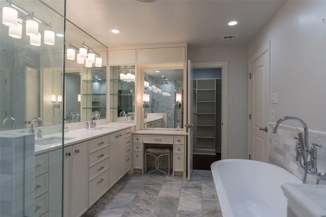 bathroom with independent shower and bath and vanity