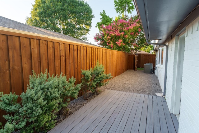 wooden deck with central AC unit