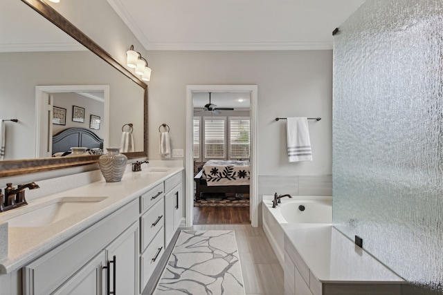 bathroom with vanity, hardwood / wood-style flooring, and crown molding