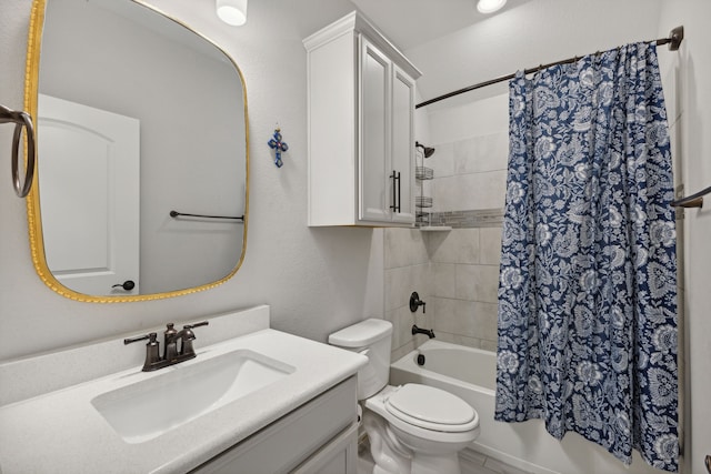 full bathroom featuring vanity, shower / bathtub combination with curtain, and toilet