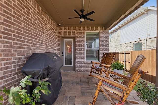 view of patio / terrace with grilling area and ceiling fan