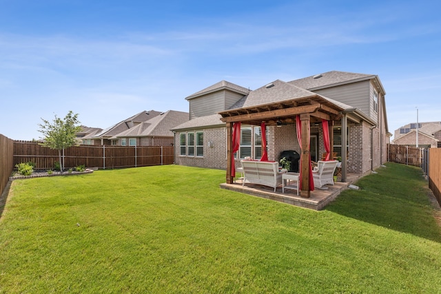 rear view of house featuring a lawn, a patio area, and outdoor lounge area