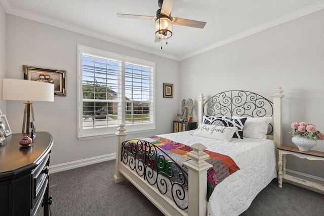 bedroom featuring ceiling fan, crown molding, and dark carpet