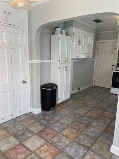 interior space featuring crown molding