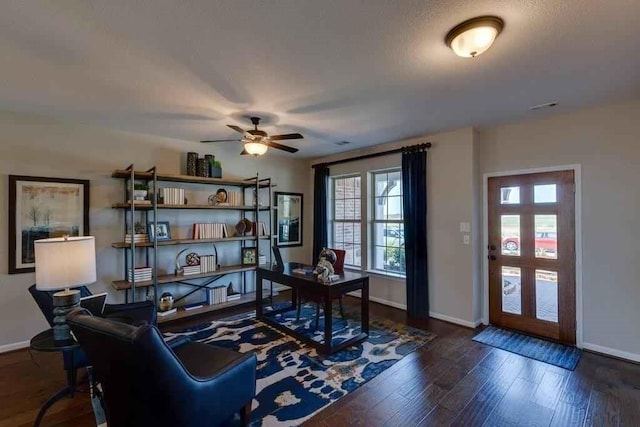 living room featuring ceiling fan, dark hardwood / wood-style flooring, and french doors