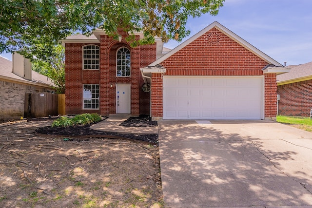 front of property with a garage