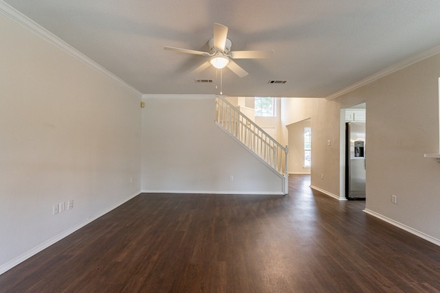 interior space featuring ceiling fan, dark hardwood / wood-style floors, and crown molding