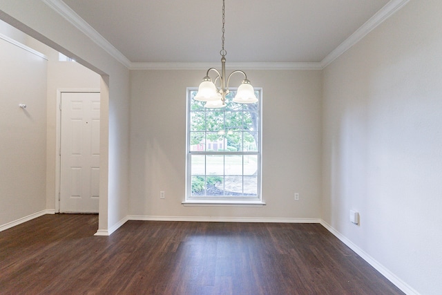 unfurnished room featuring a chandelier, dark hardwood / wood-style floors, and crown molding