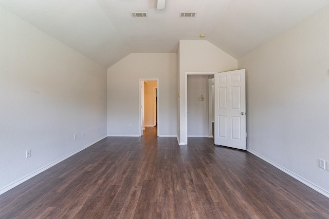 additional living space with lofted ceiling and dark hardwood / wood-style floors