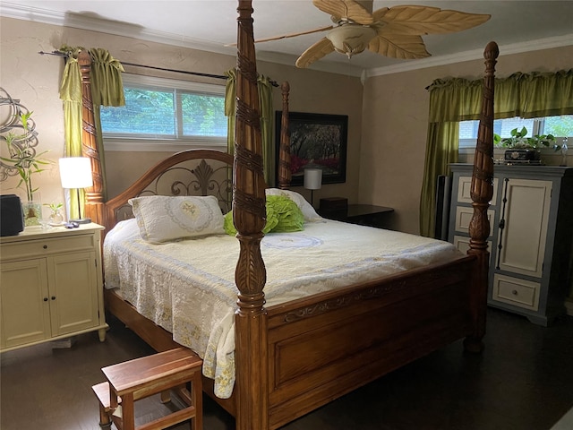 bedroom with ceiling fan and ornamental molding