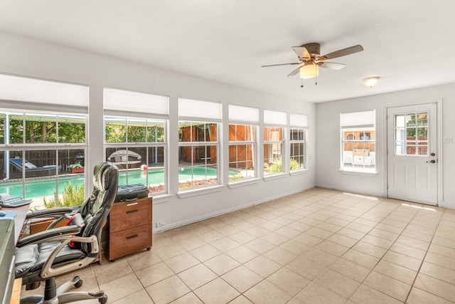 office featuring ceiling fan and light tile patterned floors