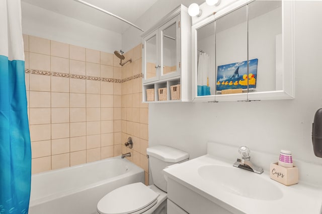 full bathroom with shower / tub combo with curtain, vanity, and toilet