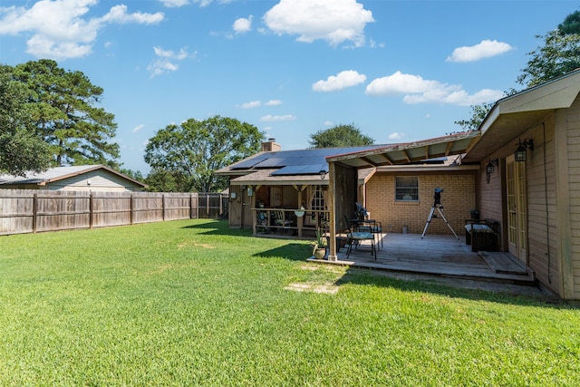 view of yard featuring a deck