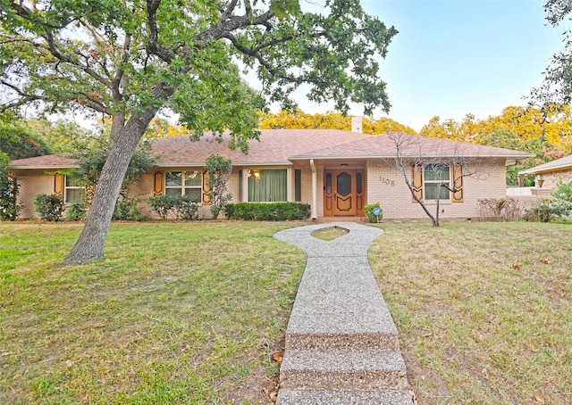 ranch-style house with a front yard