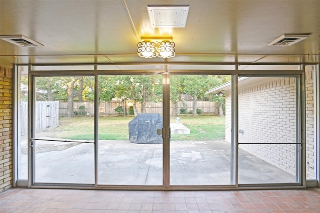 doorway to outside with a wealth of natural light