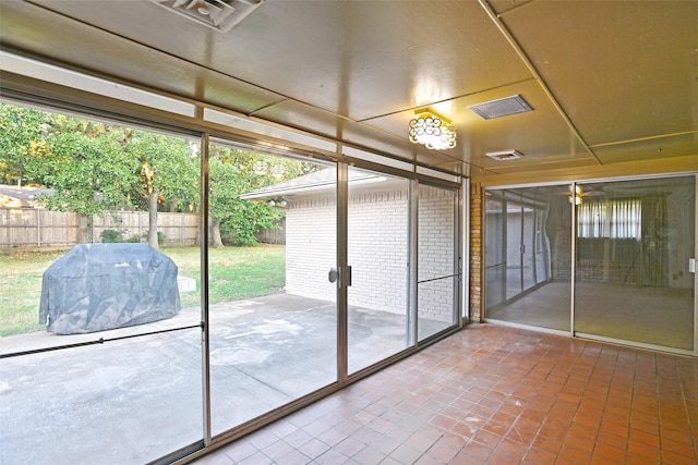 view of unfurnished sunroom