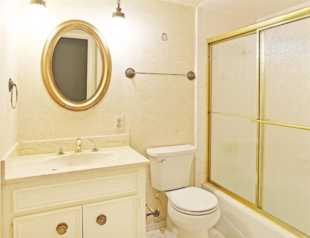 full bathroom with toilet, vanity, and combined bath / shower with glass door