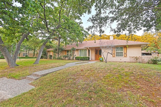 ranch-style house with a front yard