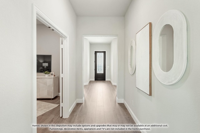 hallway featuring light wood-type flooring