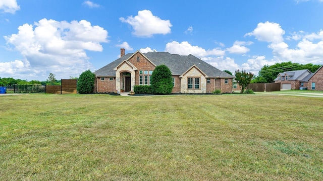 view of front of home with a front yard