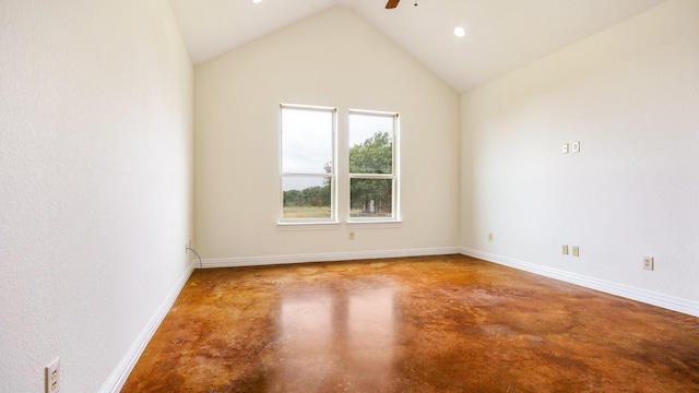 unfurnished room featuring lofted ceiling, concrete flooring, and ceiling fan