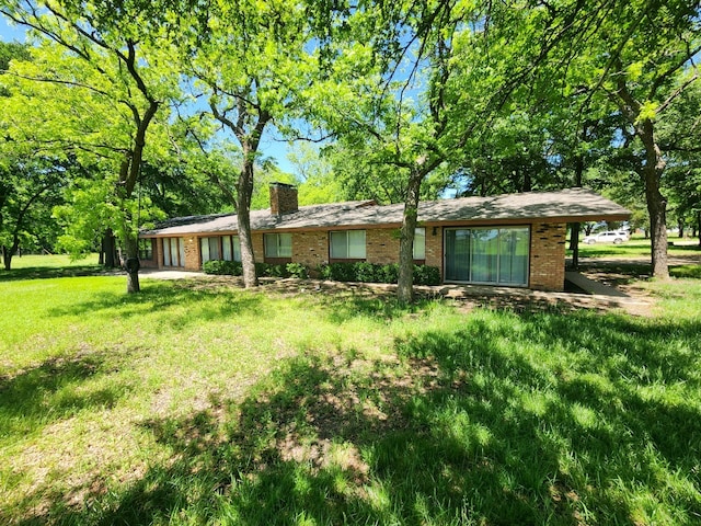 exterior space with a lawn