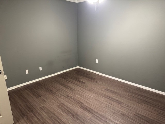 empty room featuring dark hardwood / wood-style floors