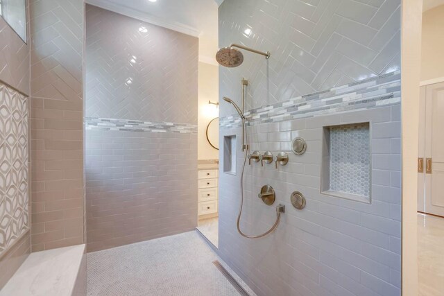 bathroom featuring a tile shower