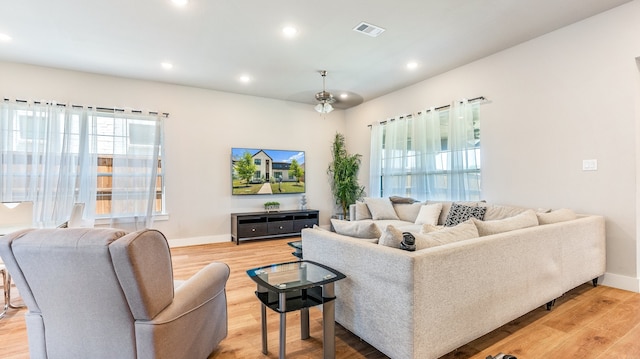 living room featuring light wood-type flooring