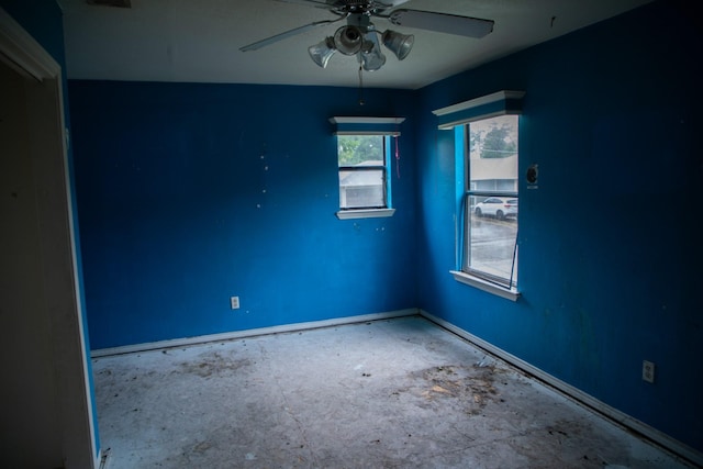 unfurnished room featuring ceiling fan