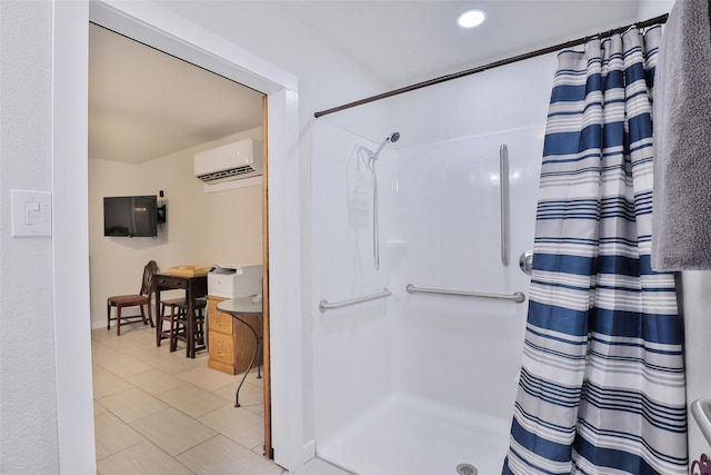 bathroom with a shower with shower curtain, a wall unit AC, and recessed lighting