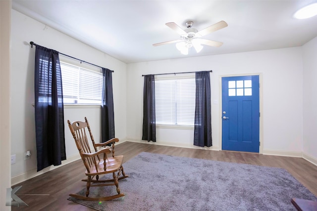 sitting room with light hardwood / wood-style flooring, a healthy amount of sunlight, and ceiling fan