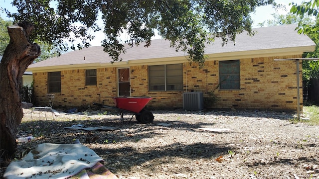 view of front of property featuring central air condition unit