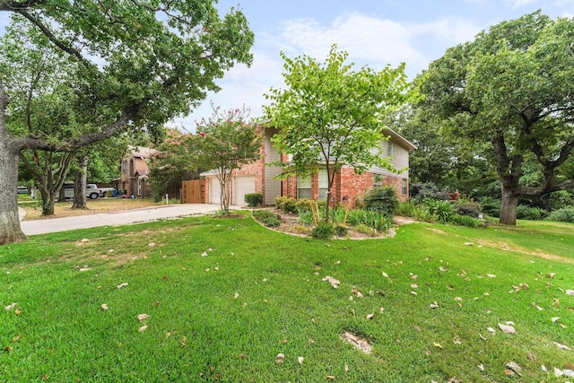 view of yard featuring a garage