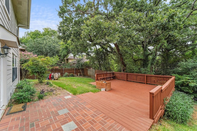 deck featuring a lawn