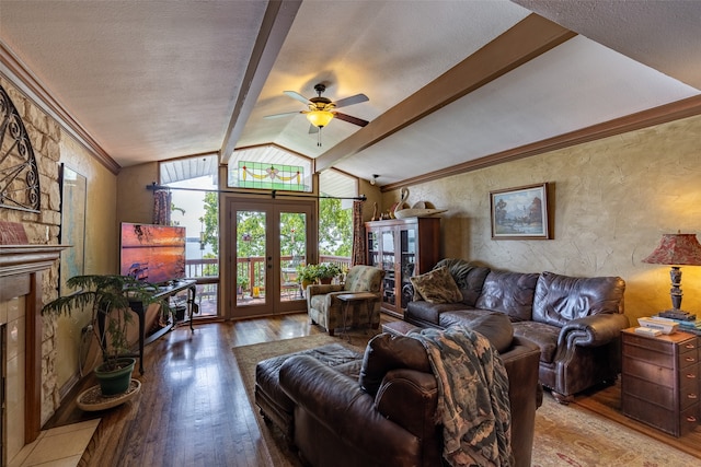 living room featuring hardwood / wood-style flooring, french doors, vaulted ceiling with beams, ceiling fan, and a textured ceiling