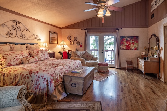 bedroom with crown molding, wood-type flooring, access to exterior, ceiling fan, and lofted ceiling