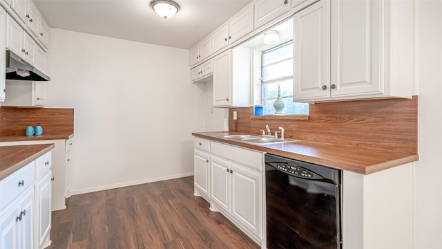 kitchen featuring white cabinetry, butcher block counters, dishwasher, and sink