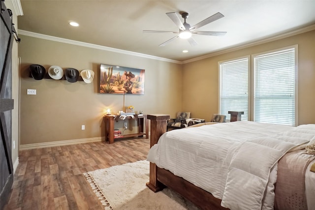 bedroom featuring crown molding, ceiling fan, and hardwood / wood-style floors