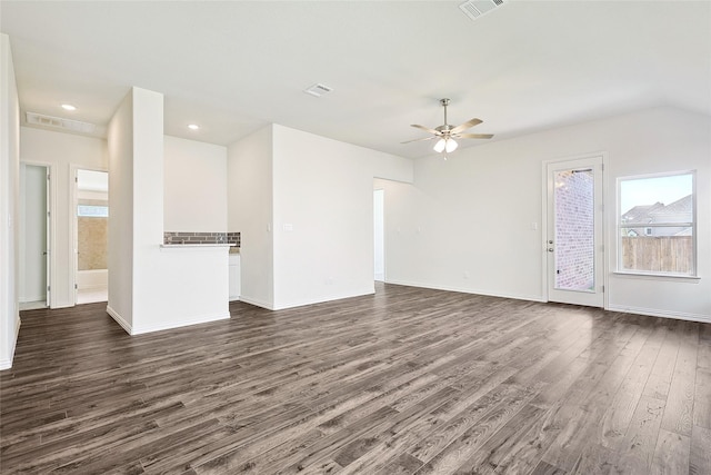 unfurnished living room with ceiling fan and dark hardwood / wood-style flooring