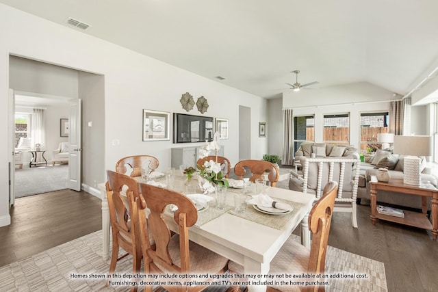 dining space featuring vaulted ceiling, wood-type flooring, and ceiling fan