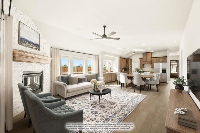 bedroom featuring carpet floors, vaulted ceiling, and ceiling fan