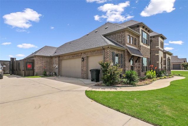 view of home's exterior with a garage and a yard