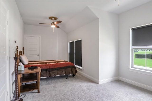 bedroom with ceiling fan and light carpet