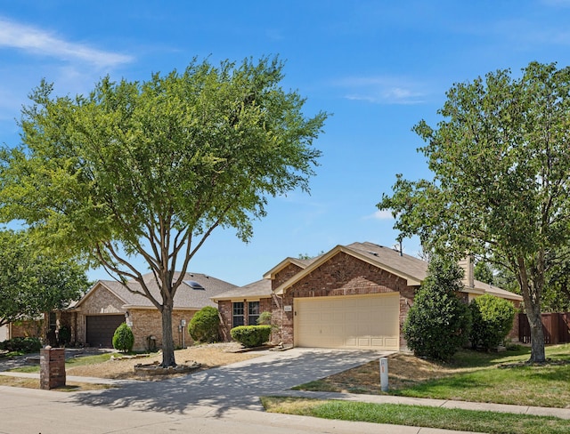 ranch-style home with a garage