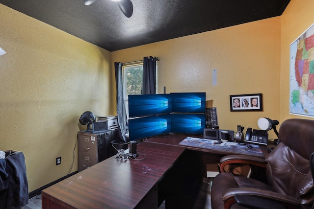 office featuring a textured ceiling and ceiling fan